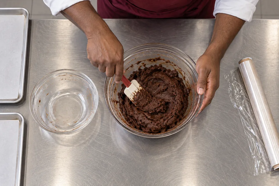 Overhead view of thick chocolate cookie dough.